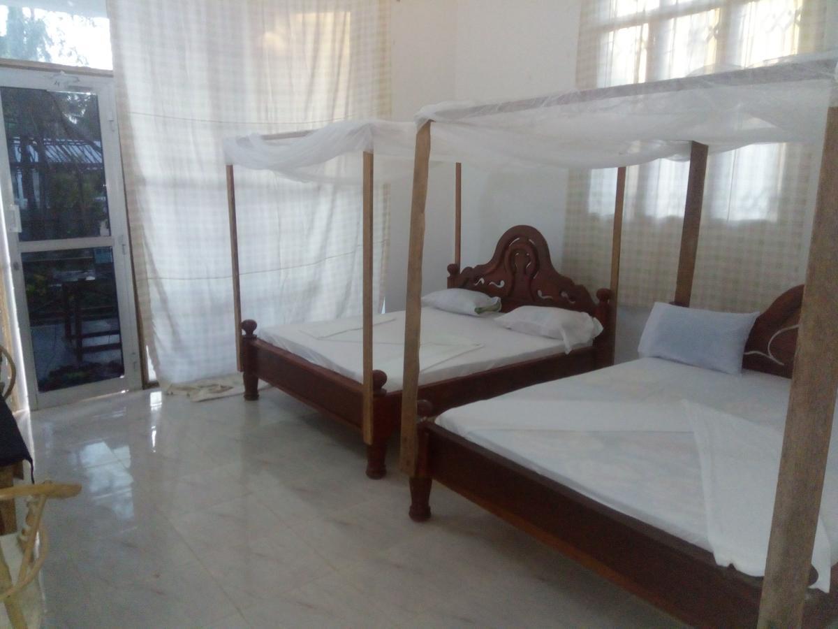 Asiya Beach Bungalow Нунгви Экстерьер фото
