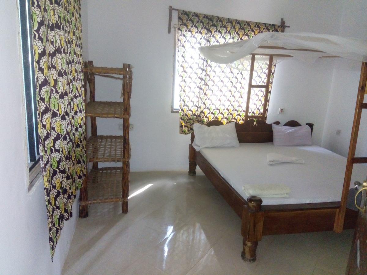 Asiya Beach Bungalow Нунгви Экстерьер фото